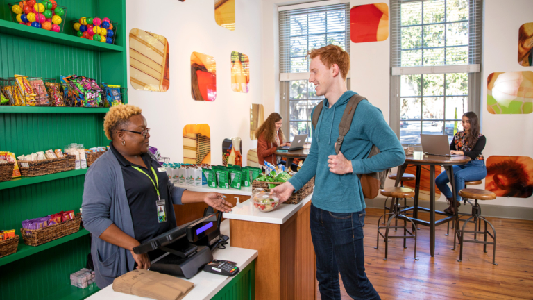 SCAD student purchases food to go from Arnold Micro Market