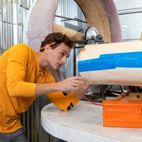 Industrial design student works on a hovercraft