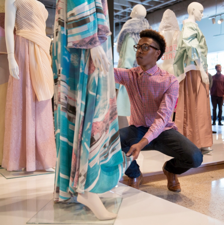 Fashion student works on design